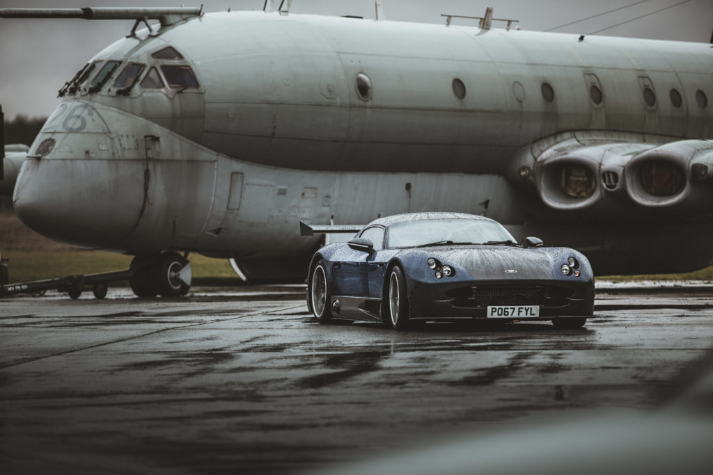 Helical's supercar next to a Nimrod aircraft at Bruntingthorpe