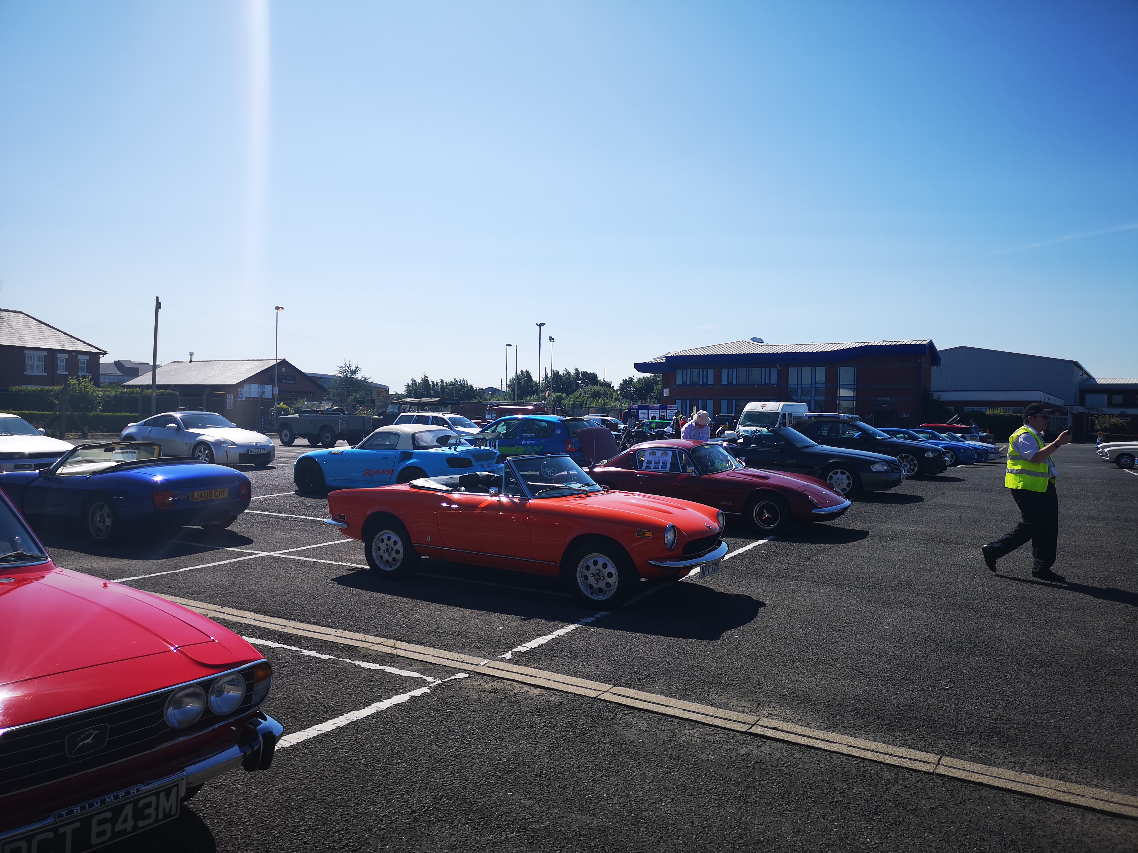 BAE Systems Charity Car Show before the start - car park getting filled up with amazing vehicles